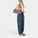 Arc Organic Cotton bag in Tobacco & Diamond, model shot