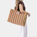Large Organic Cotton bag in Soft Pear & Posy, model shot 2